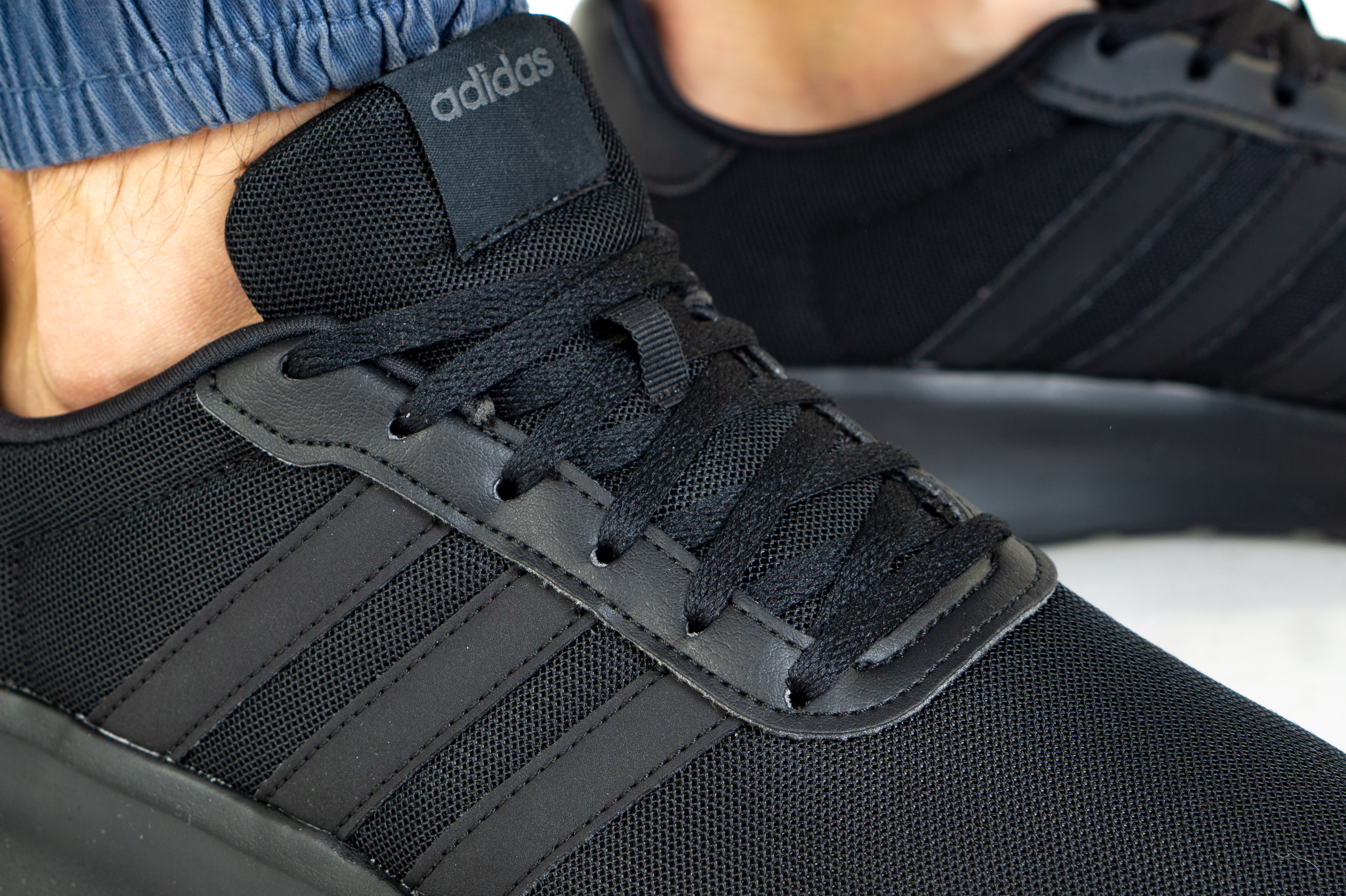 Adidas lite on sale racer triple black